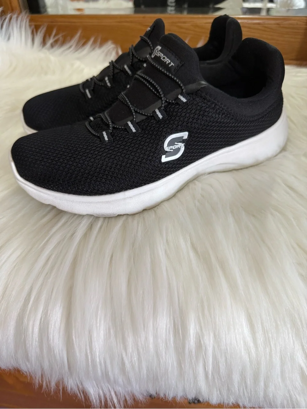 Skechers Women's Black Knit Slip-On Athletic Sneakers with White Sole